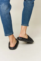 Women's edgy comfort slide sandals with pyramid studded toe band and footbed design from Trendsi.