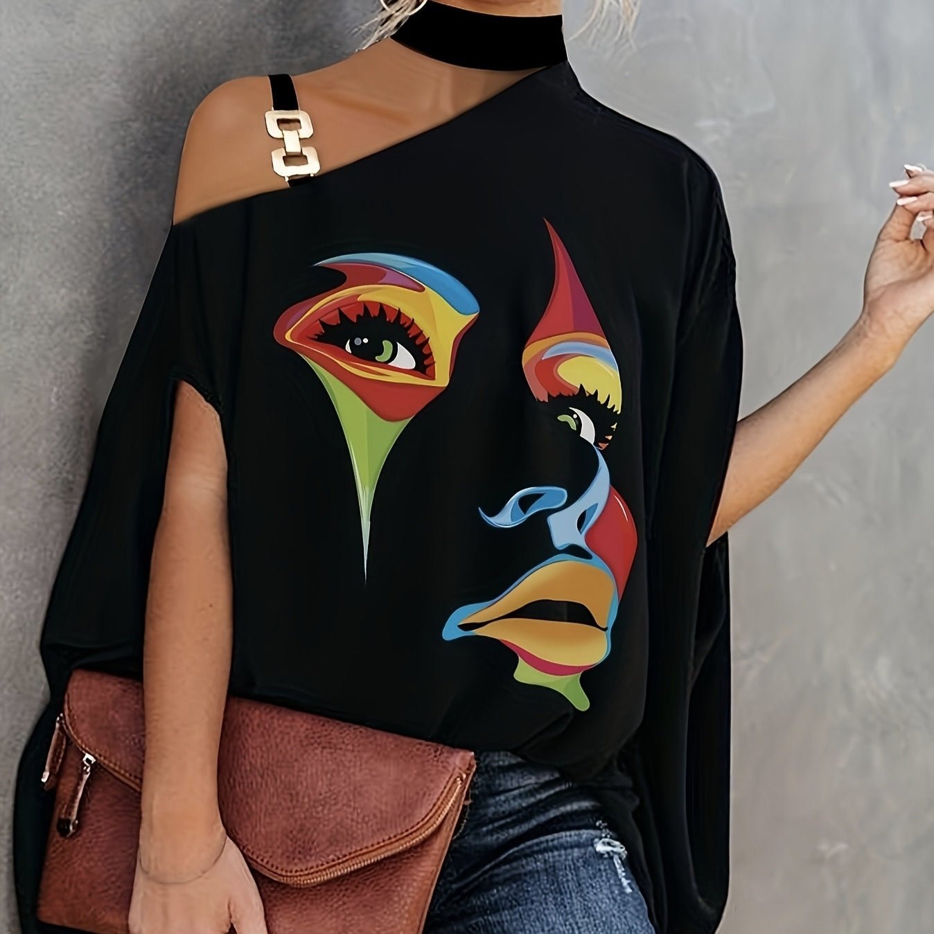 Women’s one-shoulder printed T-shirt by FitiqueFit, casualwear top with bold pattern and relaxed fit, displayed on a model.