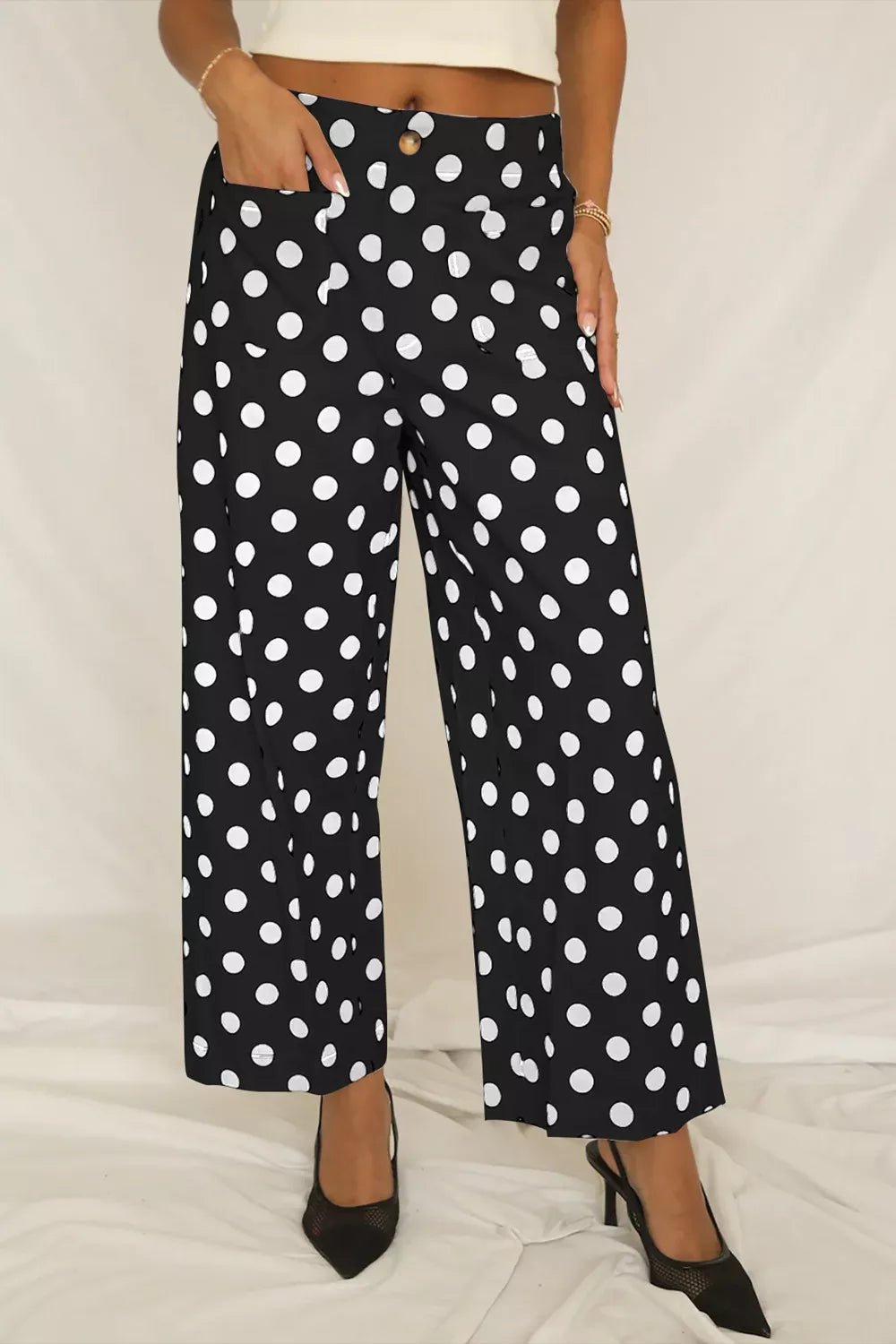 Women's polka dot straight leg pants with pockets by Trendsi, featuring a stylish fit and comfortable design.